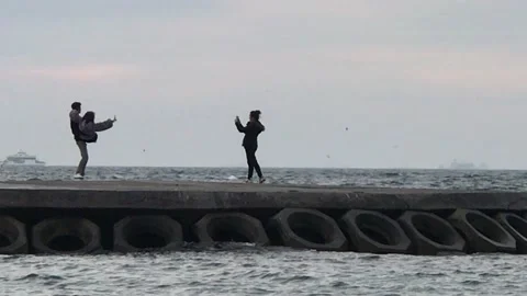 Lover having fun with sea waves Video stock 146412504