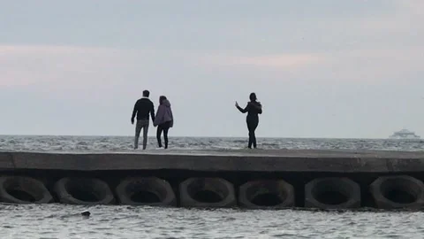 Lover having fun with sea waves Video stock 146413077