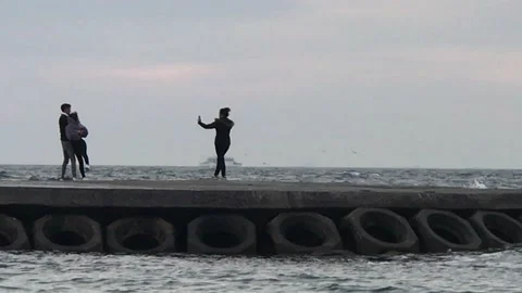 Lover having fun with sea waves Video stock 146413585