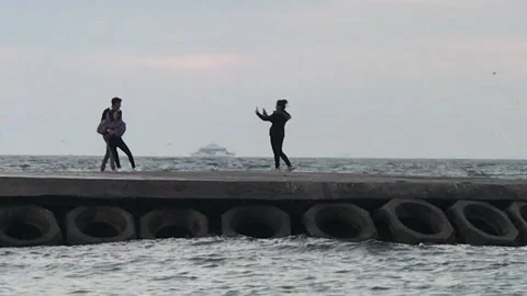 Lover having fun with sea waves Video stock 146413673