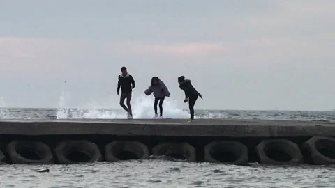 Lover having fun with sea waves Video stock 146413945