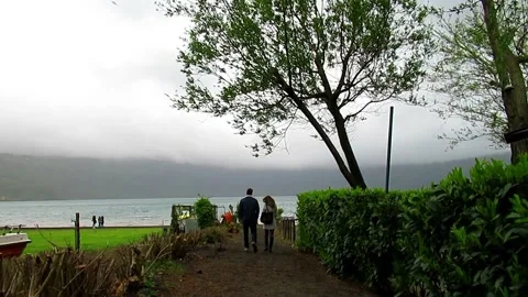 Lovers by the beach romantic walk Stock Footage 153378915