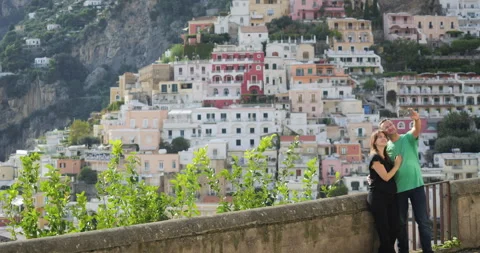 Lovers couple make selfies in front of Positano on Amalfi coast, Italy Stock Footage 298995050