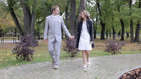Lovers couple walking in the park Stock Footage 55839363