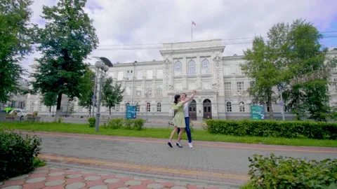 Lovers dance in the street Video stock 169834746