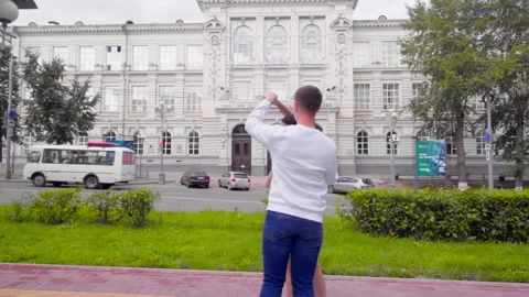 Lovers dancing in the street Stock Footage 182037220