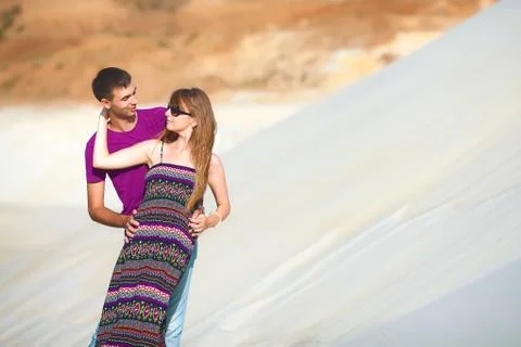 Lovers in desert Stock Photos