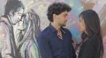 lovers exchange of tenderness for the graffiti behind a couple kissing HD Footage