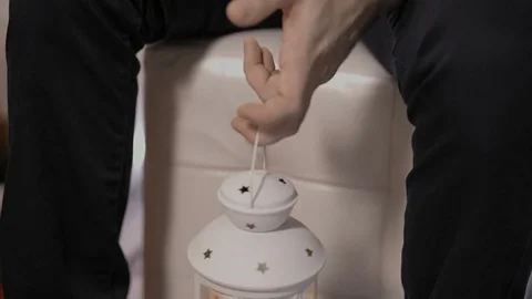 Lovers holding a candle in a candlestick Stock-Footage 81933311
