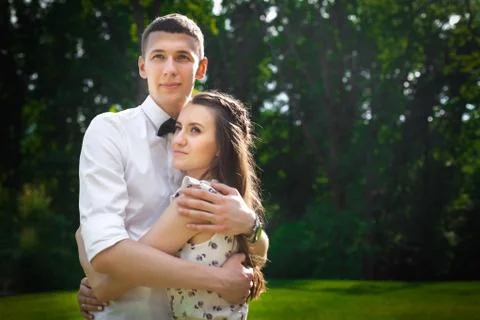 Lovers hugging in forest Stock Photos