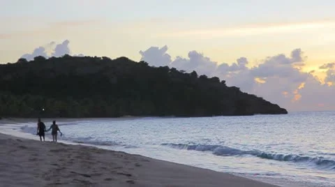 Lovers at the island beach in sunset Stock Footage 8927131