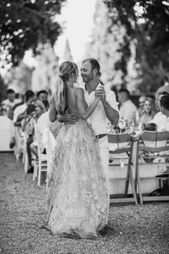 Lovers look at each other while dancing Foto stock
