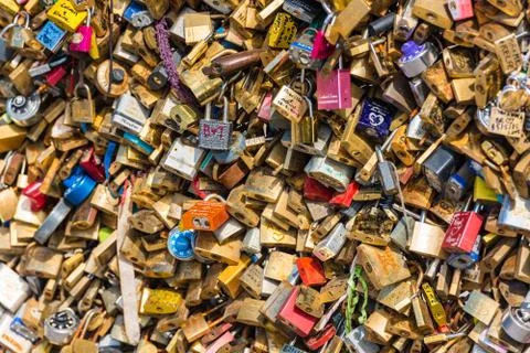 Lovers padlocks on a bridge in Paris Stock Photos