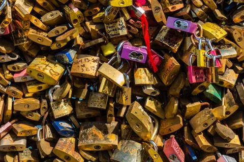 Lovers padlocks on a bridge in Paris Stock Photos