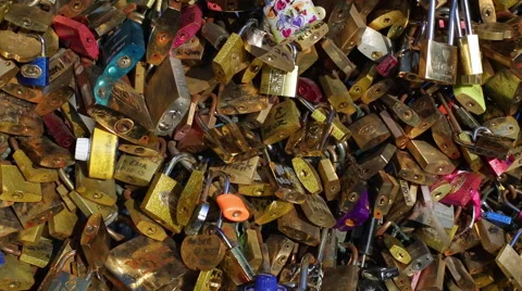 Lover's padlocks or love locks which adorn many bridges in Paris, France Stock Footage 54136139