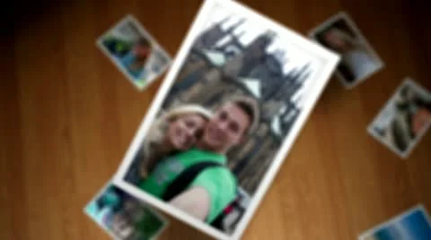 Lovers photos falling down Video stock 10826940