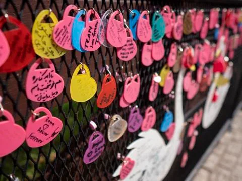 Lovers put colorful wish notes on wish wall on French village Malaysia Stock Photos