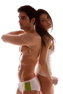 Lovers Standing Back To Back Stock Photos