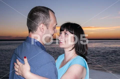 Lovers on a sunset background Stock Photos