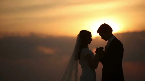 Lovers at sunset Stock Footage
