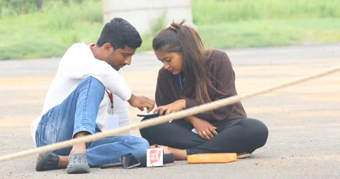 Lovers Useing Phone at Resort Stock Footage 288118970