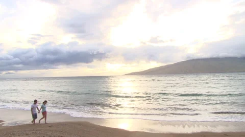 Lovers Walk Maui Beach at Sunset Stock Footage 37806037