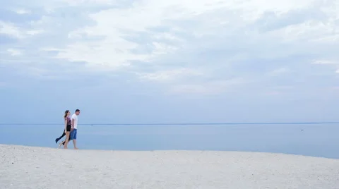 Lovers walking on the bank of the river Stock Footage 67403996