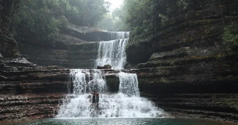 Lovers at water fall Video stock 340118609