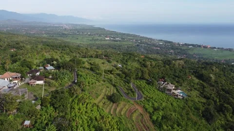 Lovina hillside coastal hover Stock Footage 329895576