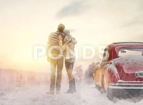 Loving couple and vintage car Stock Photos
