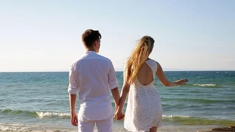 A loving couple on the beach Stock Footage 81092122