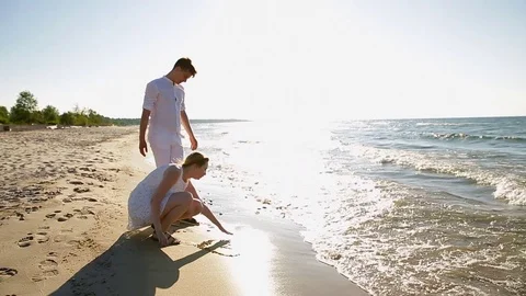 A loving couple on the beach Stock Footage 81109805
