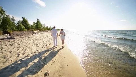 A loving couple on the beach Stock Footage 81115254