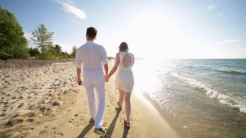 A loving couple on the beach Stock Footage 81115693