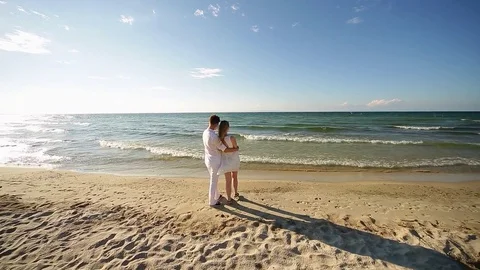 A loving couple on the beach Stock Footage 81115808