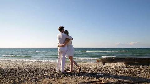 A loving couple on the beach Stock Footage 81207348