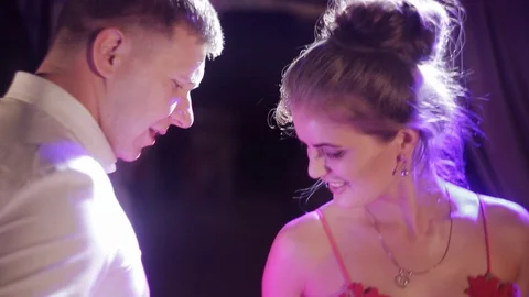 Loving couple dancing in the club Stock Footage