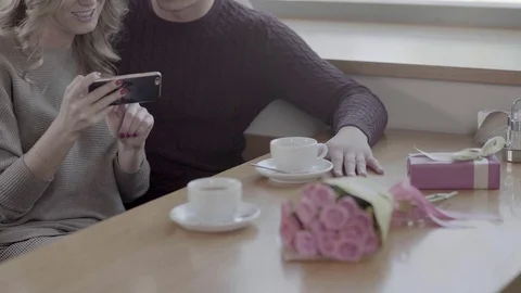 Loving couple doing selfie on a mobile phone. Guy hugs girl 스톡 동영상 72083846