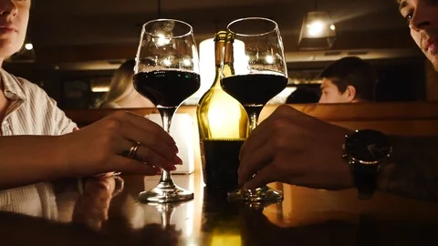 Loving couple drinking wine on a date Stock Footage
