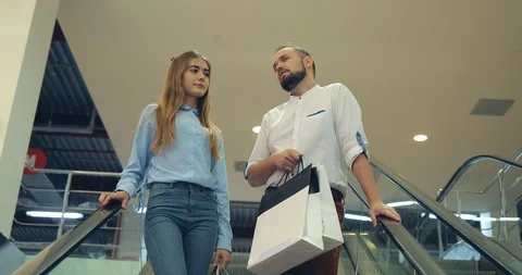 Loving couple on the escalator Stock-Footage 95925025
