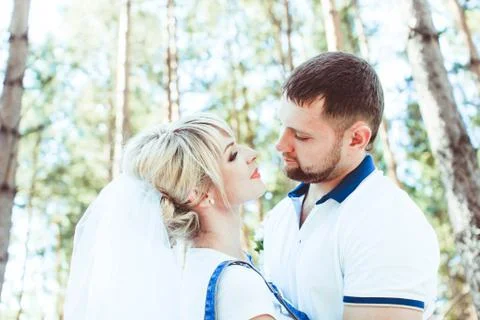 Loving couple in the forest Stock Photos