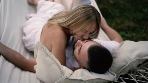 Loving couple in hammock, millennials Stock Footage 280350873