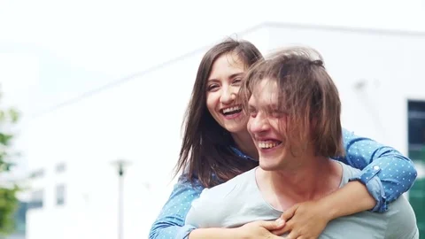 A loving couple is having fun in nature. Summer vacation. Relax together. The Stock Footage
