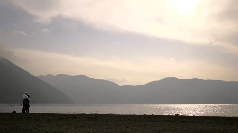 Loving couple in the lakeside Stock Footage 50175160