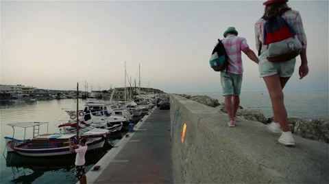 Loving couple on the pier Stock Footage 49832243