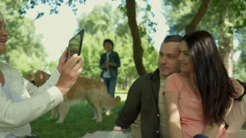 Loving couple posing to make a photo Stock Footage