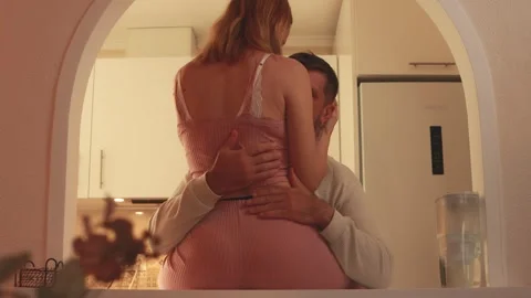 Loving couple sharing tender kitchen moments, warmly embracing, softly kiss.. 스톡 동영상 305695899