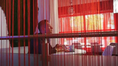 A loving couple sits down at a table in a cafe Stock Footage 75805277