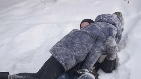 Loving couple in the snow Stock Footage 72249205