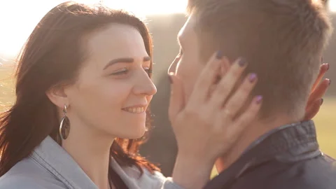 Loving couple spends time together in a recreation park Stock Footage 89979355